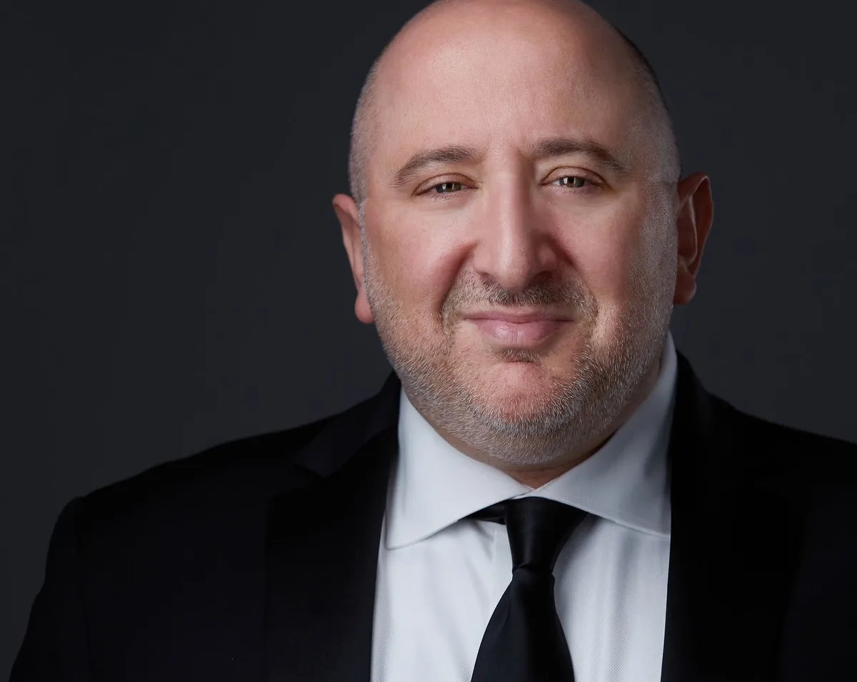 Adam Glaser 2021 conducting headshot
